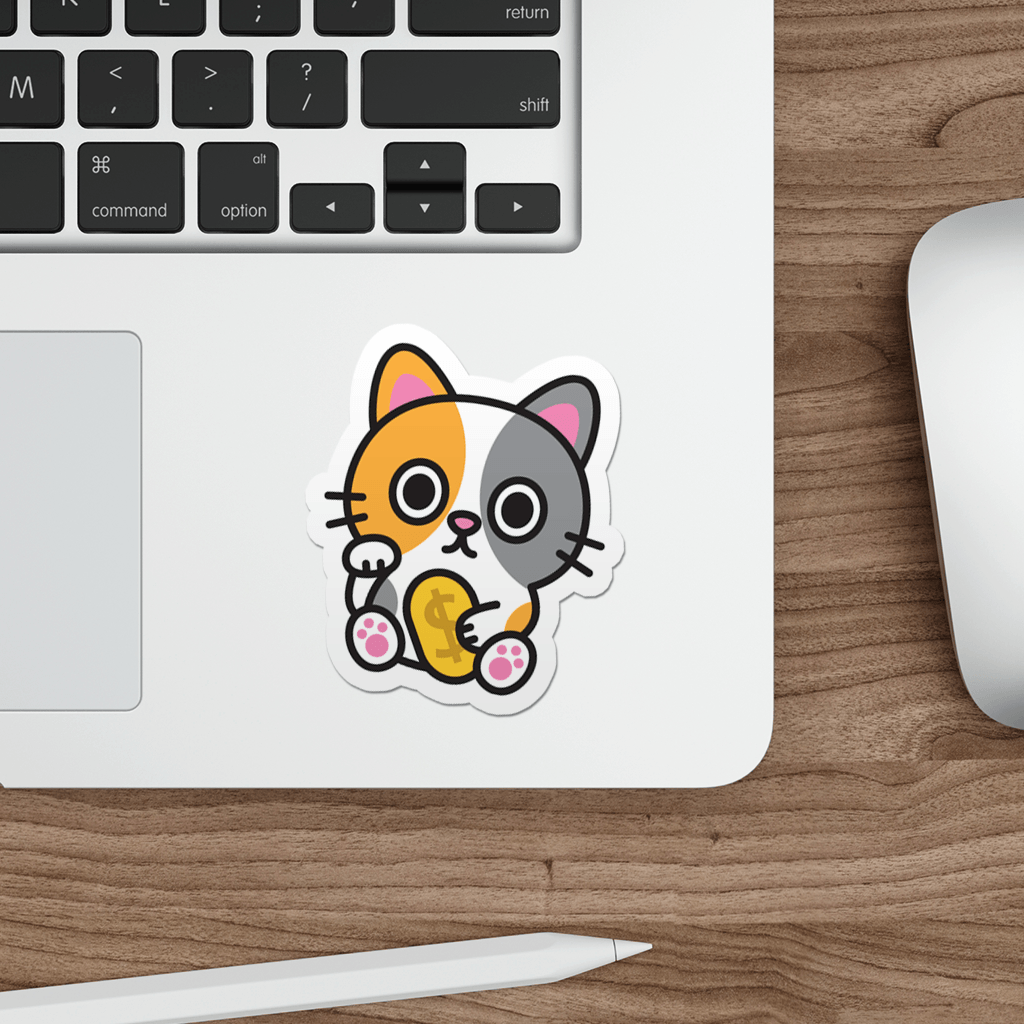 Laptop with a sticker of a kawaii lucky cat on a wooden desk.