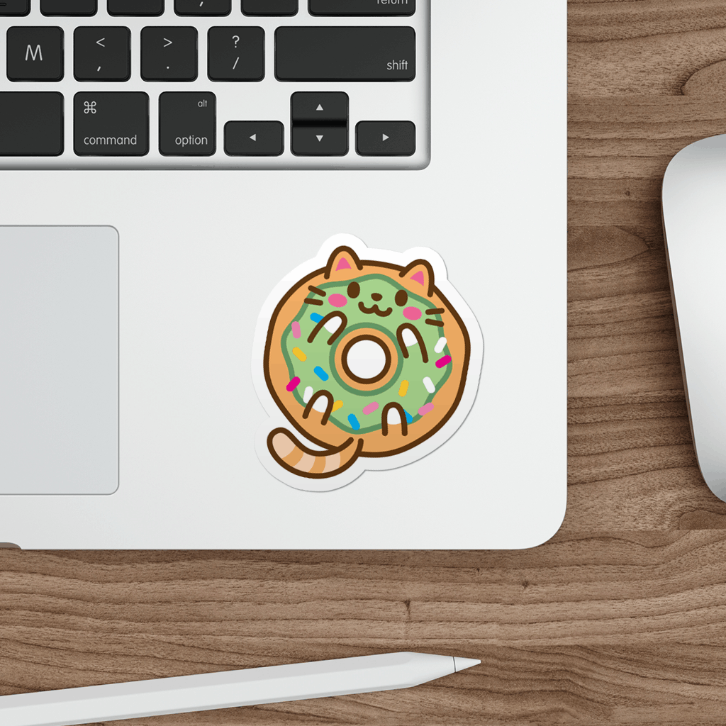 Laptop with a cute green donut cat sticker on a wooden desk