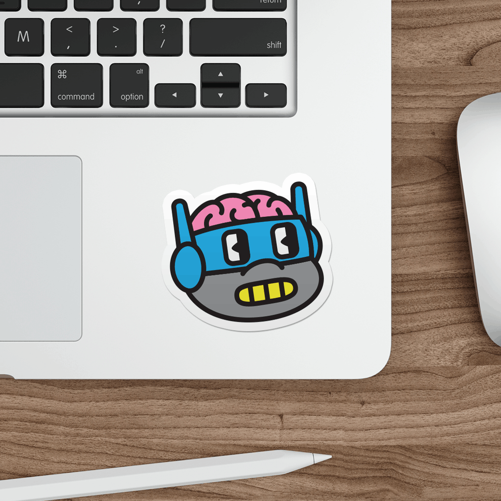 Laptop with a sticker of a cartoon ninja turtle on a wooden desk.