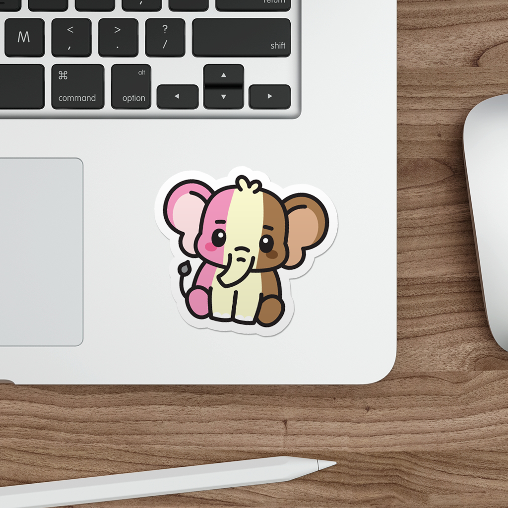 Laptop with a sticker of a cartoon ice-cream elephant on a wooden desk.