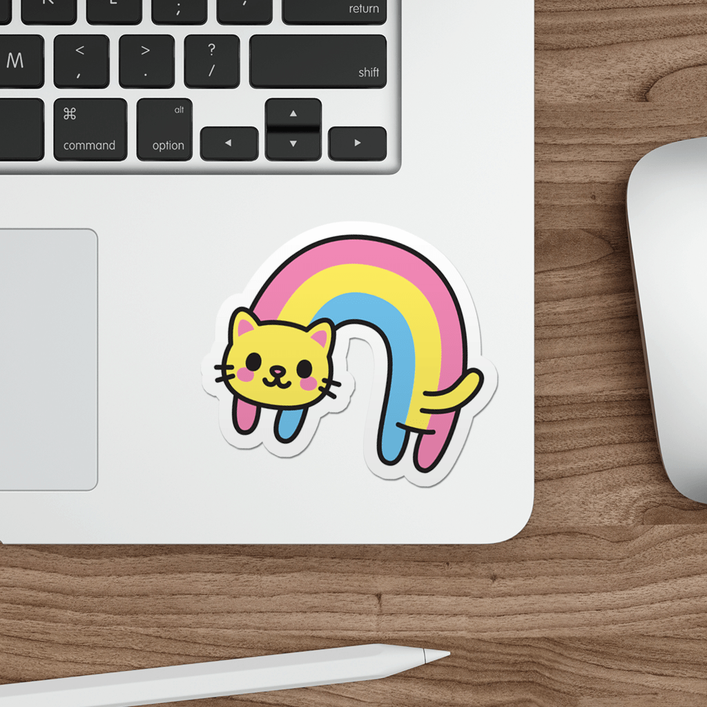 Laptop with a sticker of a kawaii rainbow cat on a wooden desk.