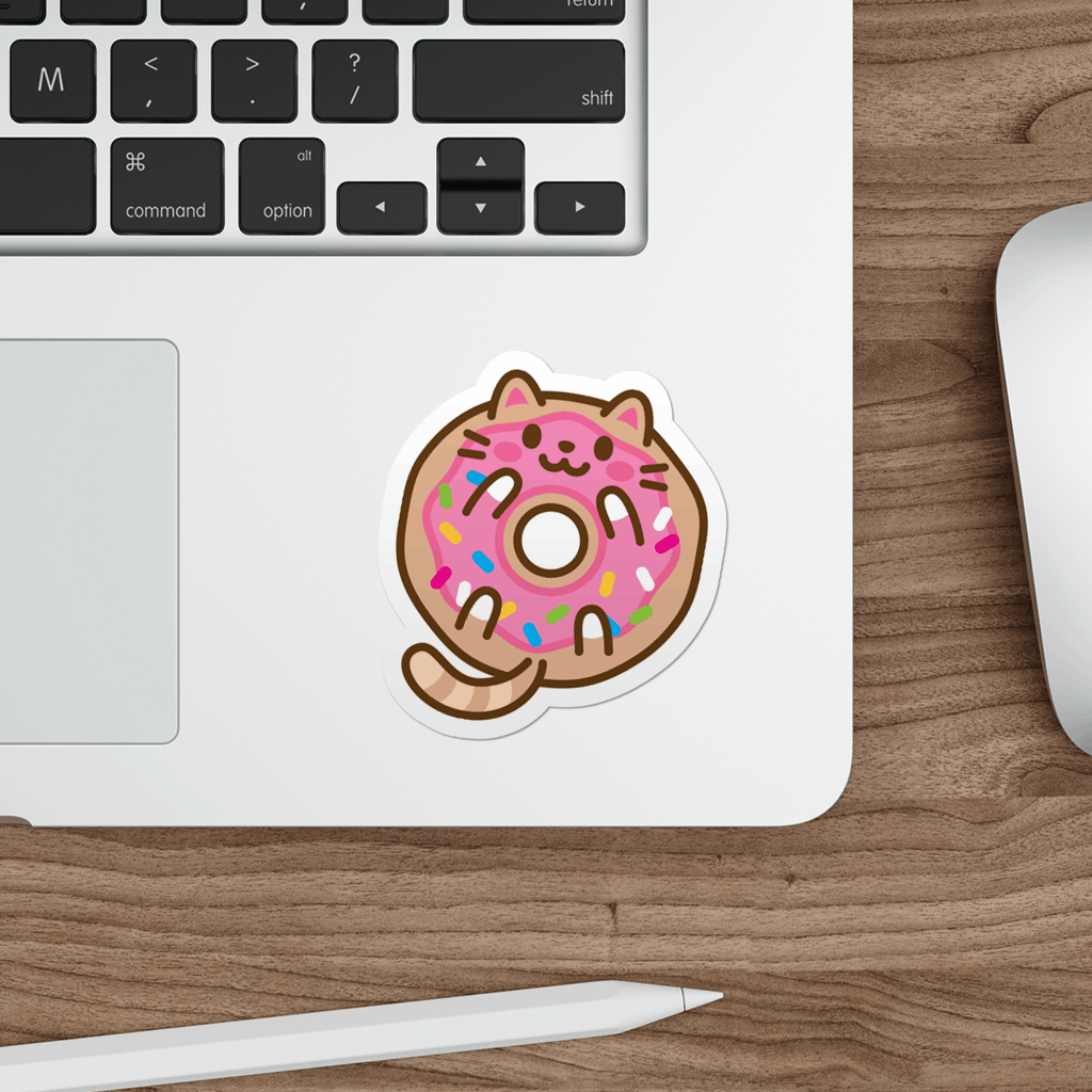 Laptop with a cute pink donut cat sticker on a wooden desk