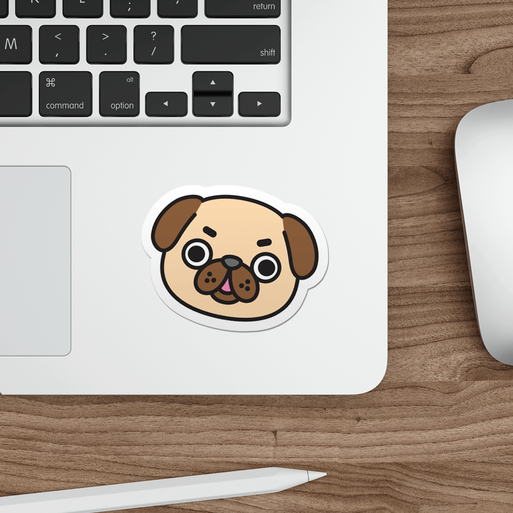 Laptop with a sticker of a pugs face on a wooden desk